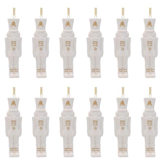 Melrose 4.5" White Porcelain Nutcracker Ornaments, 12ct. in White/Gold | Michaels®
